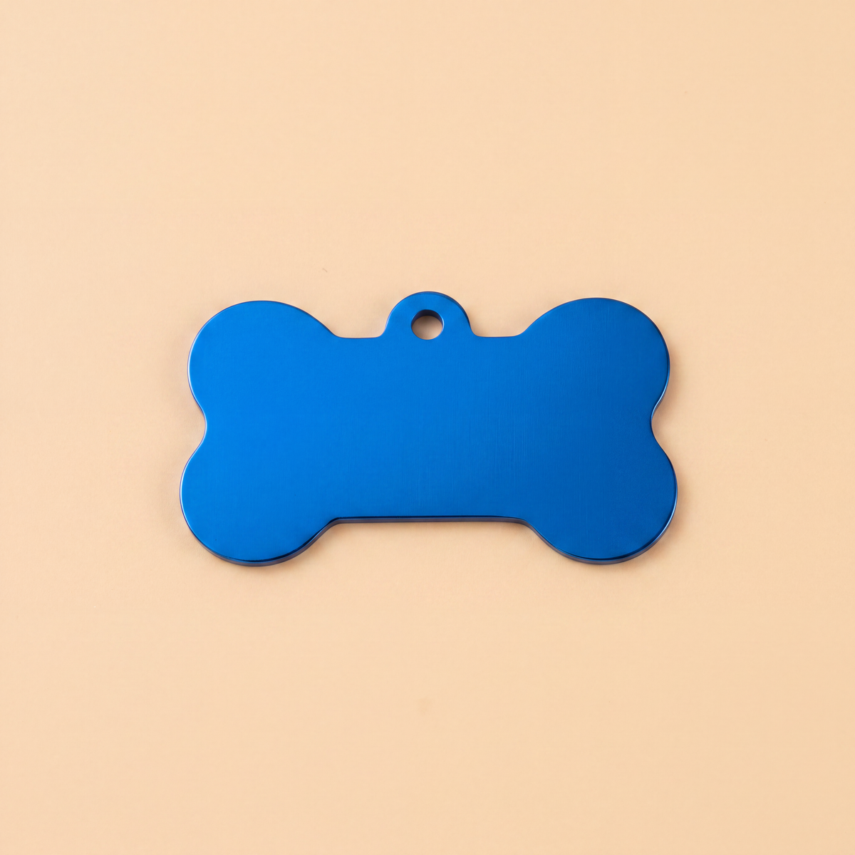 Hondenpenning in botvorm van roestvrij staal, blauw