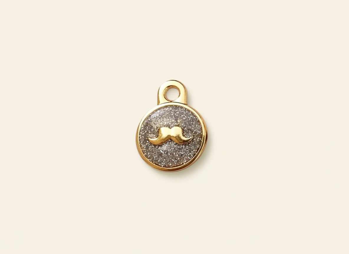 Ronde glitterpenning met snormotief in Britse stijl, grijs