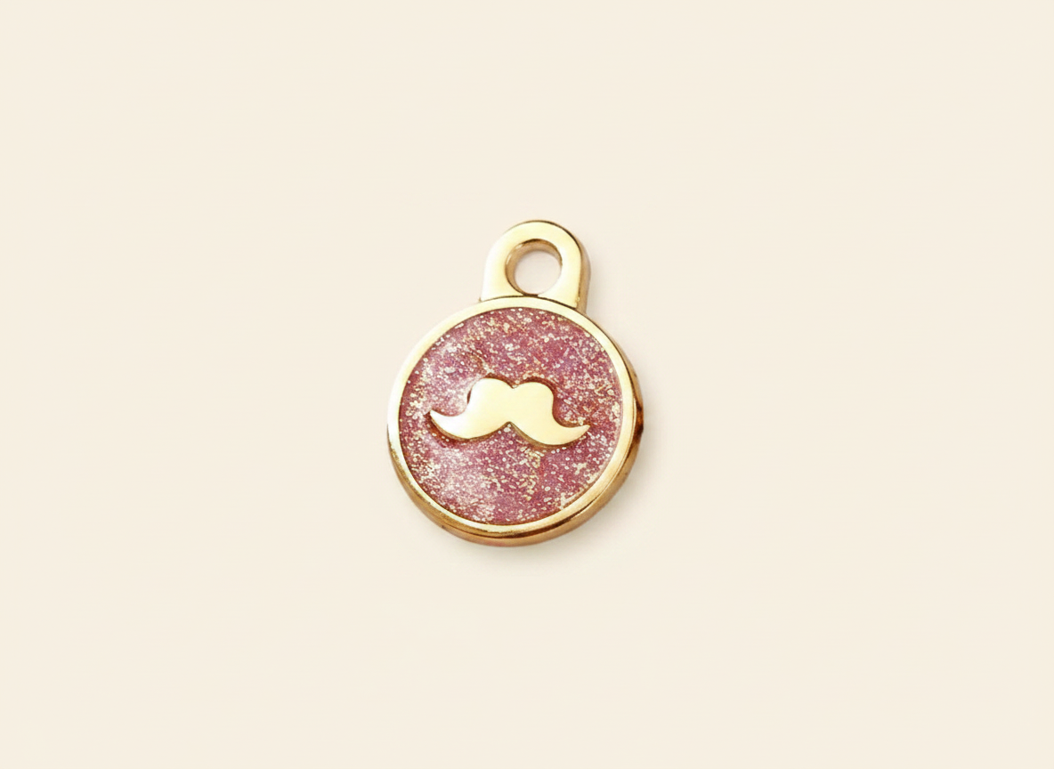 Ronde glitterpenning met snormotief in Britse stijl, roze